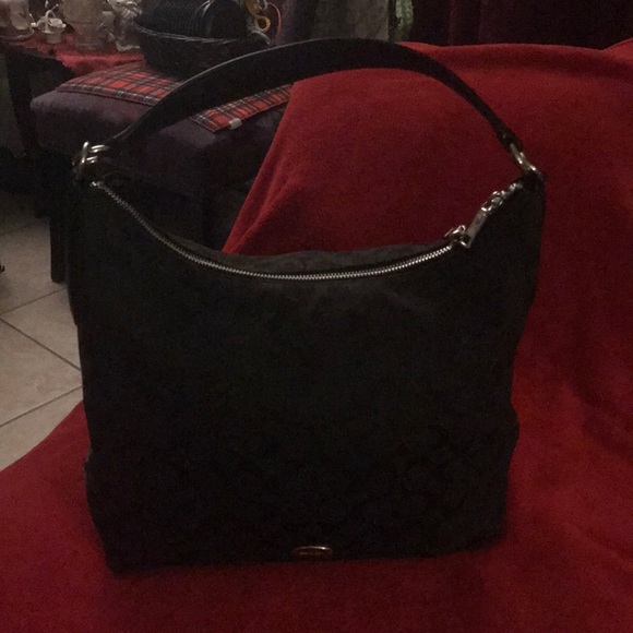 Coach Handbags - Elegant Black Shoulder Bag with Silver Zip Detail